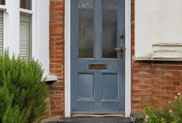 Front door in High Wycombe before repainting with a dull worn entrance