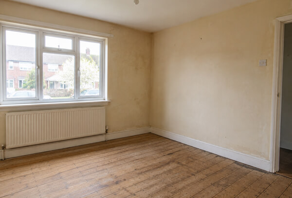 High Wycombe room before interior wall painting with uneven colour and visible marks