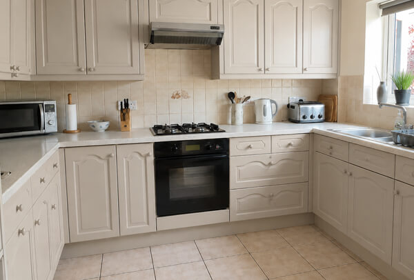 Kitchen cabinets after a fresh painted colour update