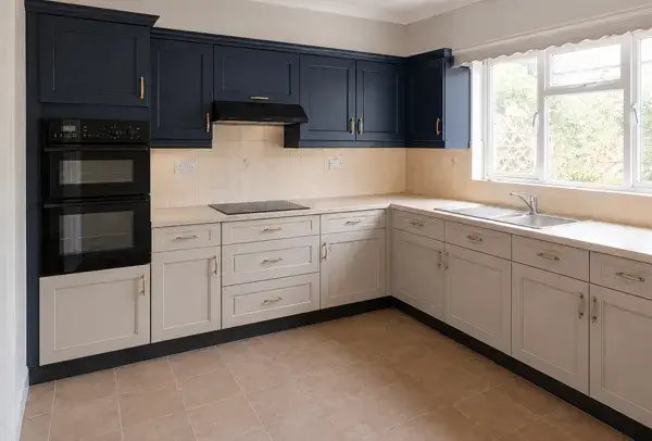 Kitchen cabinets in High Wycombe after painting with a clean modern colour scheme