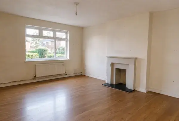 Living room in High Wycombe before redecoration with marked walls and tired paintwork