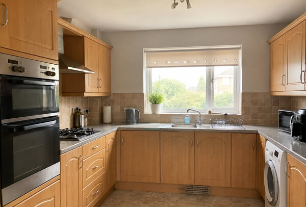 Older kitchen cupboards before being painted in High Wycombe
