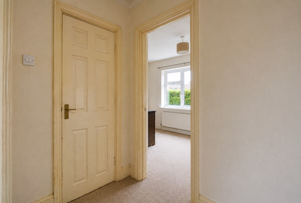High Wycombe internal woodwork before painting with worn skirting boards and marked frames