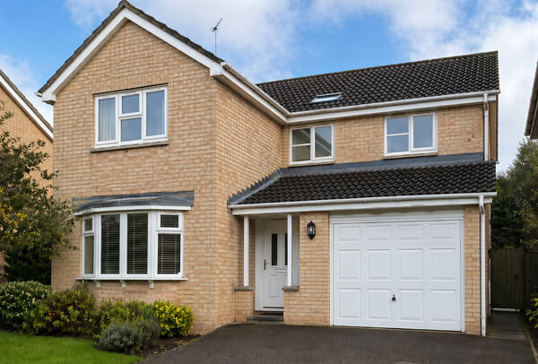 House exterior in Northampton after washing, with cleaner brickwork and outside walls