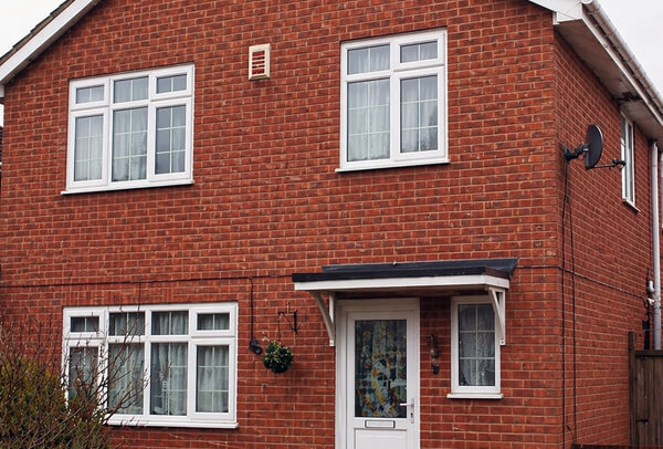 House exterior in Northampton after washing, with cleaner walls and a fresher overall look