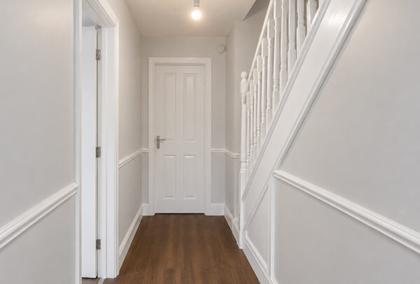 Internal woodwork in Bedford after painting with clean skirting boards doors and frames