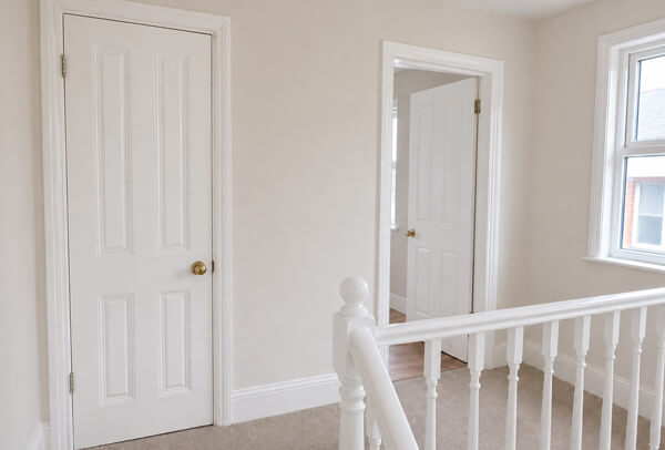 Internal woodwork in Luton after painting with clean doors, frames and skirting boards