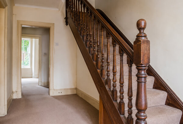 Internal woodwork in Oxford before painting with marked skirting boards and older door frames