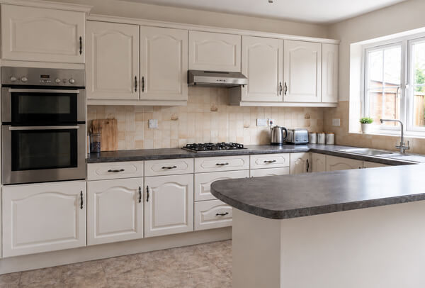 Kitchen cabinets after painting with a cleaner updated finish