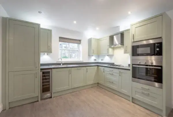 Painted kitchen cupboards after transformation in Milton Keynes
