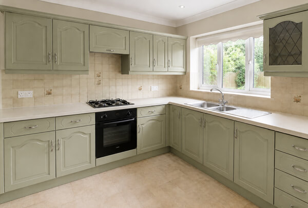 Kitchen cupboard doors in Northampton after professional respraying with a smooth new finish