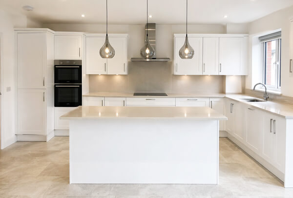 Older kitchen cupboard doors in Northampton before painting, with a worn finish