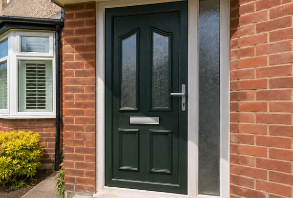 Front door in Luton after painting, with a clean and modern finish