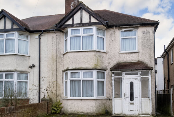 Property in Luton before painting and exterior cleaning, with dull and weathered outside surfaces