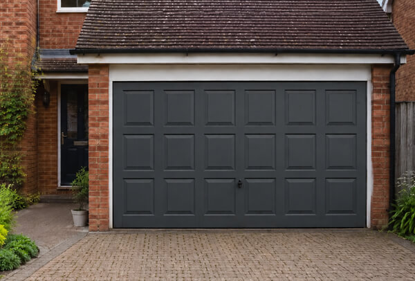 Garage door after repainting, showing a more suitable exterior colour