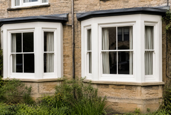 Exterior window frames in Oxford after painting, with a smarter and more coordinated finish