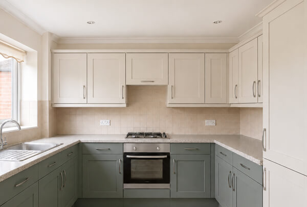 Painted kitchen cupboards in Northampton after careful use and cleaning