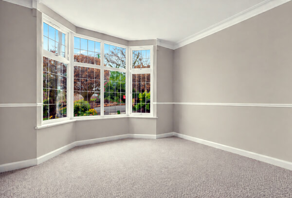Room in Northampton before painting and decorating, with dated walls and worn paintwork