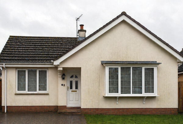 Rendered exterior wall before cleaning in Milton Keynes