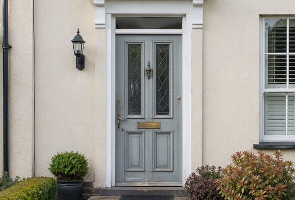 Front door in Luton before repainting, showing an older finish that does not suit the home