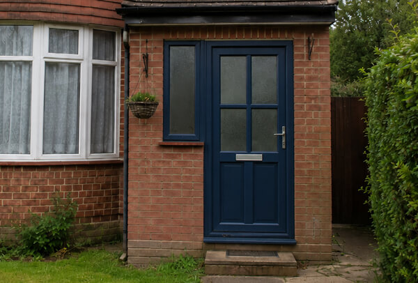 Front door after repainting, showing a fresh finish without replacing the door