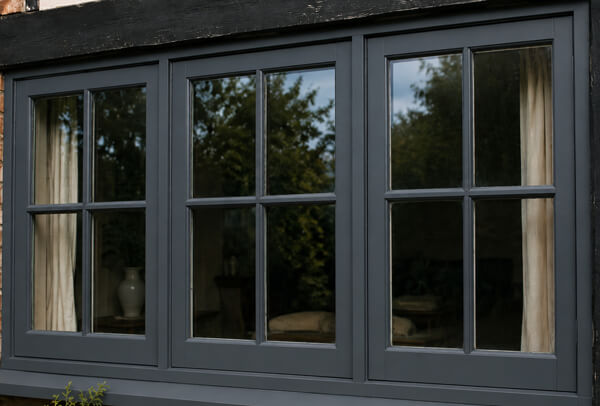 Timber window frames after preparation and repainting in Aylesbury
