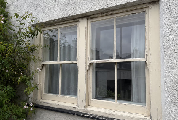 Existing window frames before suitability check in Dunstable