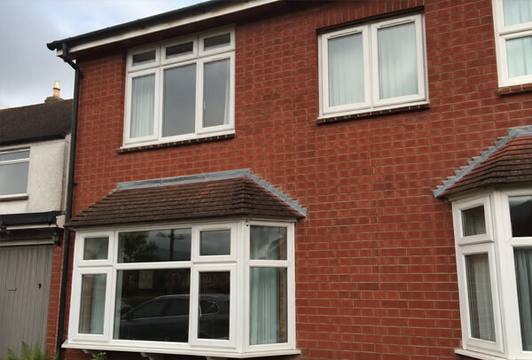 Plain exterior window frames before painting in Dunstable