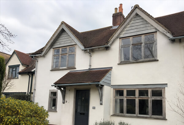 Character timber windows before repainting in Watford