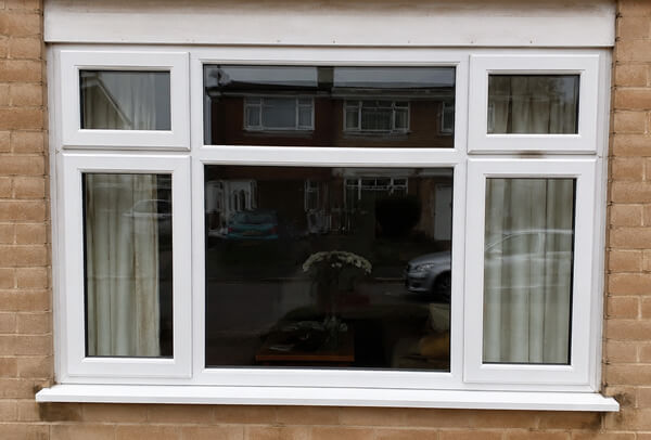uPVC window frames before a new exterior finish in Watford