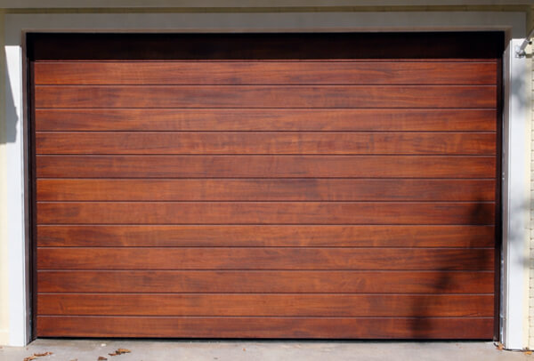 Timber garage door after painting in Milton Keynes