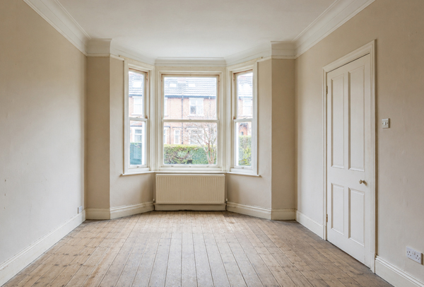Room in Dunstable before wall painting with marked walls and an older colour