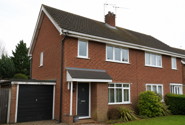 Exterior roofline trim before painting in Dunstable