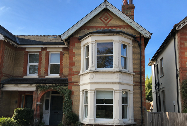 Roofline trim before painting in Dunstable with faded exterior details