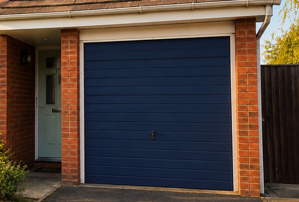 Side hinged garage doors after painting in Watford