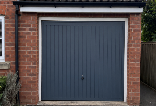 Garage door after a deep green colour change in Dunstable