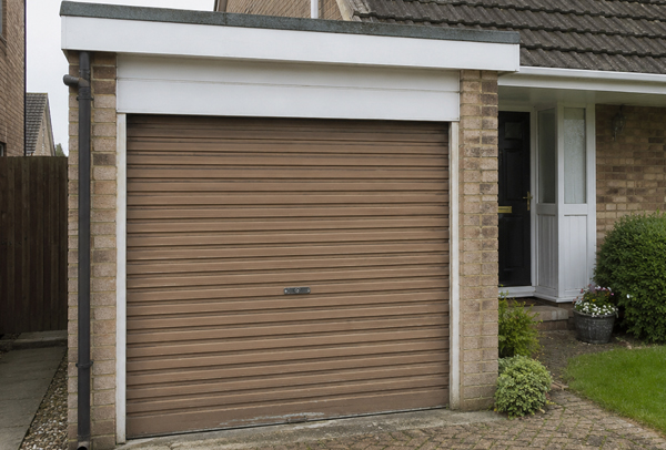 Large garage door before painting in Dunstable