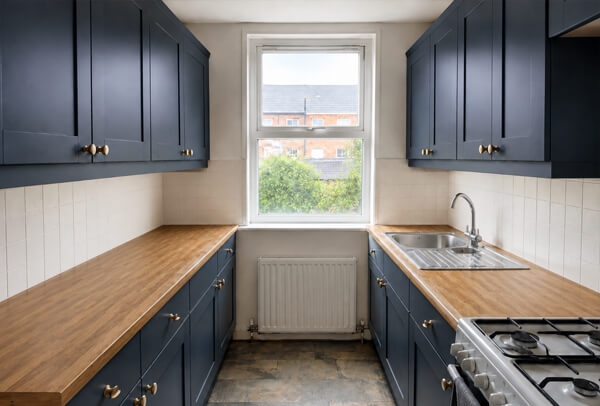 Painted kitchen cabinets after a soft green and white refresh in Aylesbury