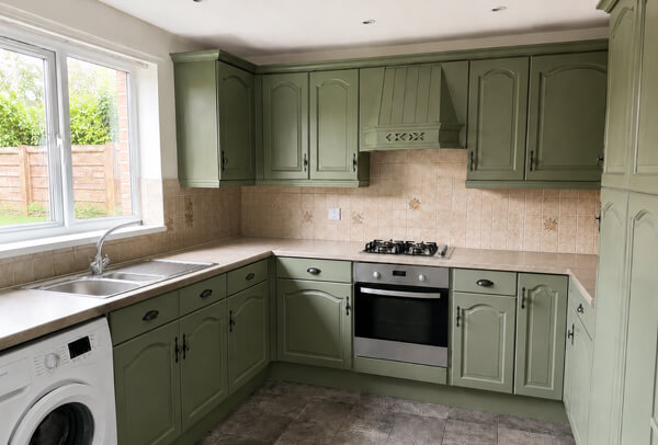 Kitchen cupboards after a calm neutral repaint in Aylesbury
