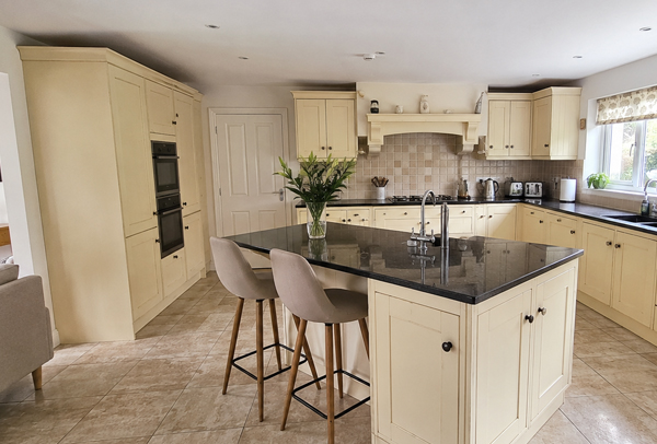 Kitchen cabinet doors with worn handle areas before preparation in Aylesbury