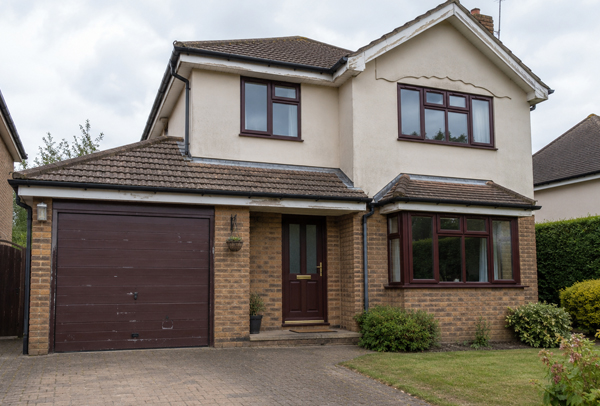 Home in Woburn before property painting with older colours and faded exterior details