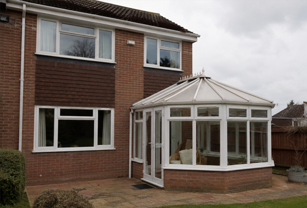 Exterior frames in Brackley before painting with faded and dated colours