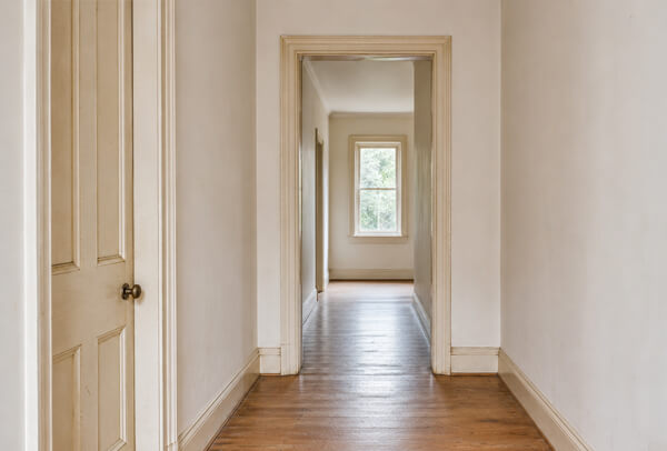 Interior woodwork in Aylesbury before painting with marked skirting boards and door frames