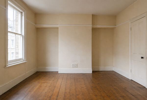 Home interior in Stevenage before painting and decorating with dull walls and older trim