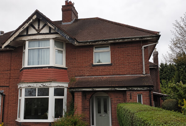Exterior trim before painting in Houghton Regis with faded roofline colour