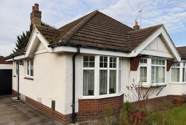 Bargeboards gutters and downpipes before painting in Aylesbury