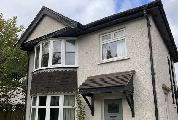 Roofline before colour change in Aylesbury with dated fascias and gutters