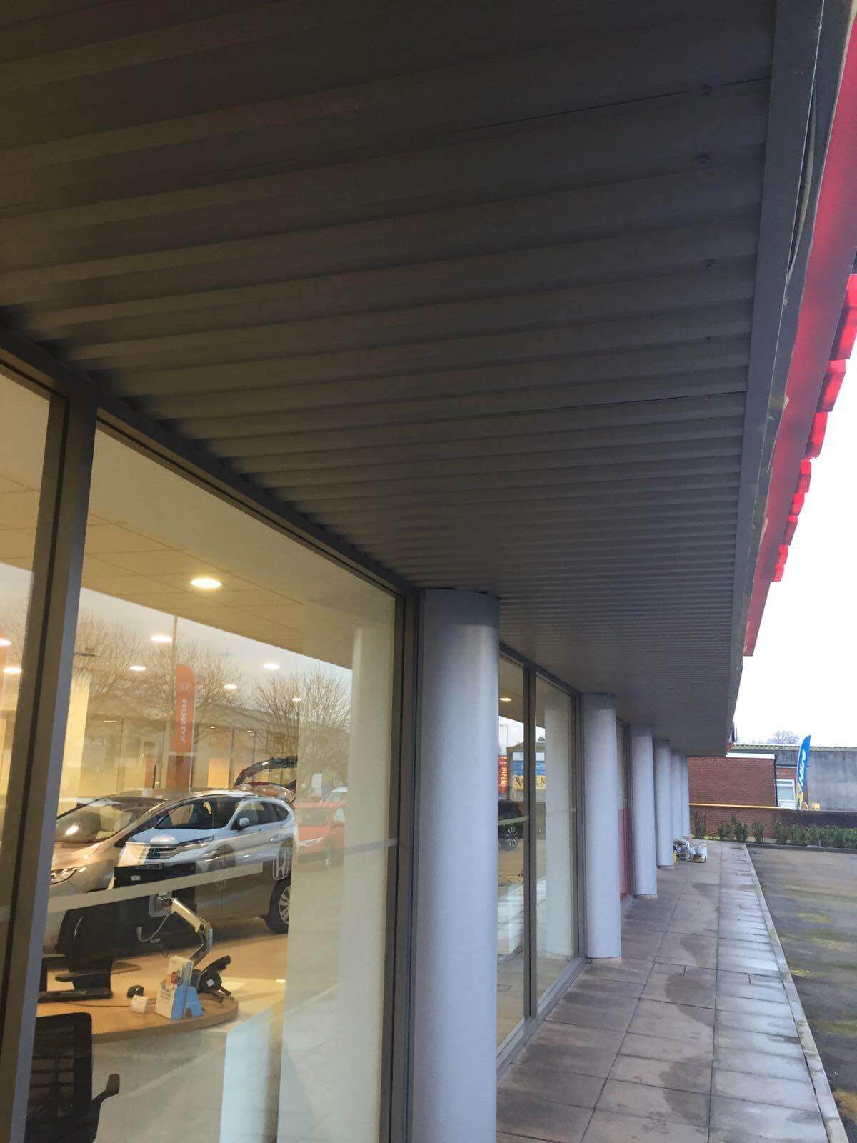 Painting of Curtain Walling & Cladding Exeter Devon